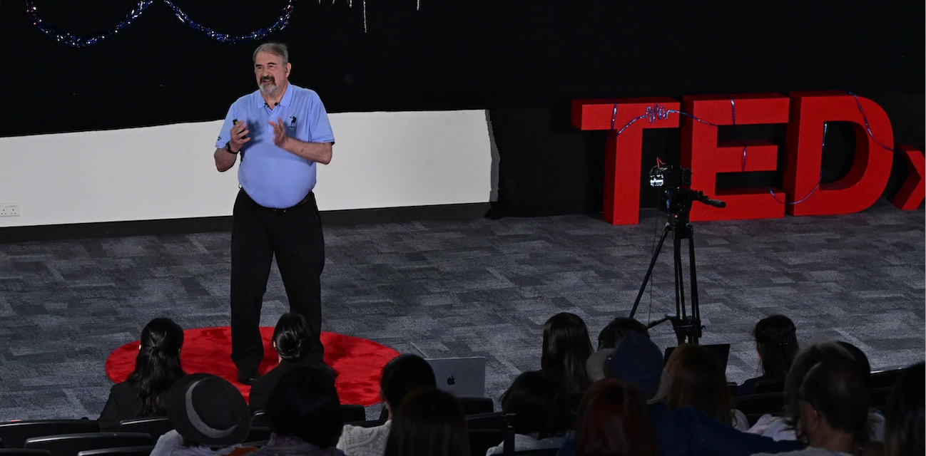 Chris Lonsdale delivering his 2026 TEDx Hong Kong talk on learning any language in six months